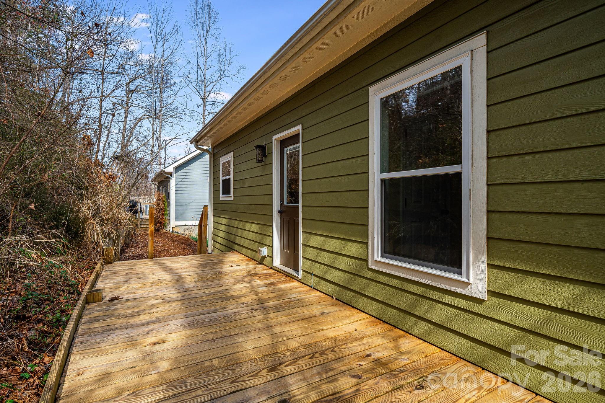309 London Road Asheville, NC 28803 - Photo 40 of 41 a view of a house with a large window
