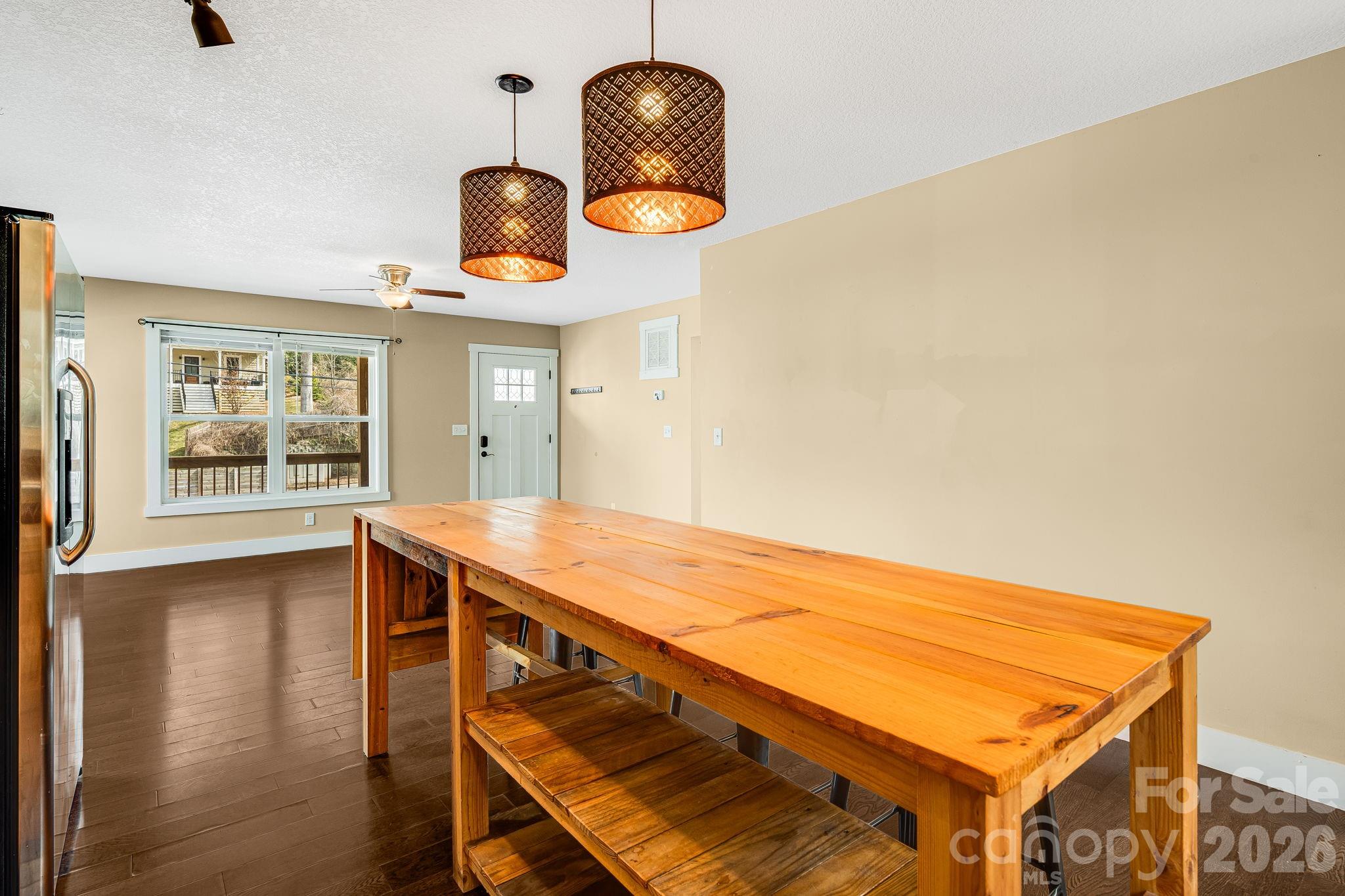 309 London Road Asheville, NC 28803 - Photo 8 of 41 a room with table and window