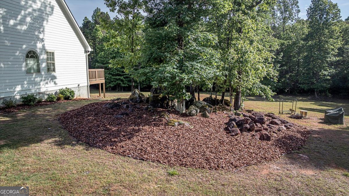 3093 Surry Ridge Drive Watkinsville, GA 30677 - Photo 40 of 41 a view of a house with a yard and sitting area