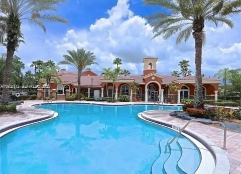 a front view of house with yard and patio