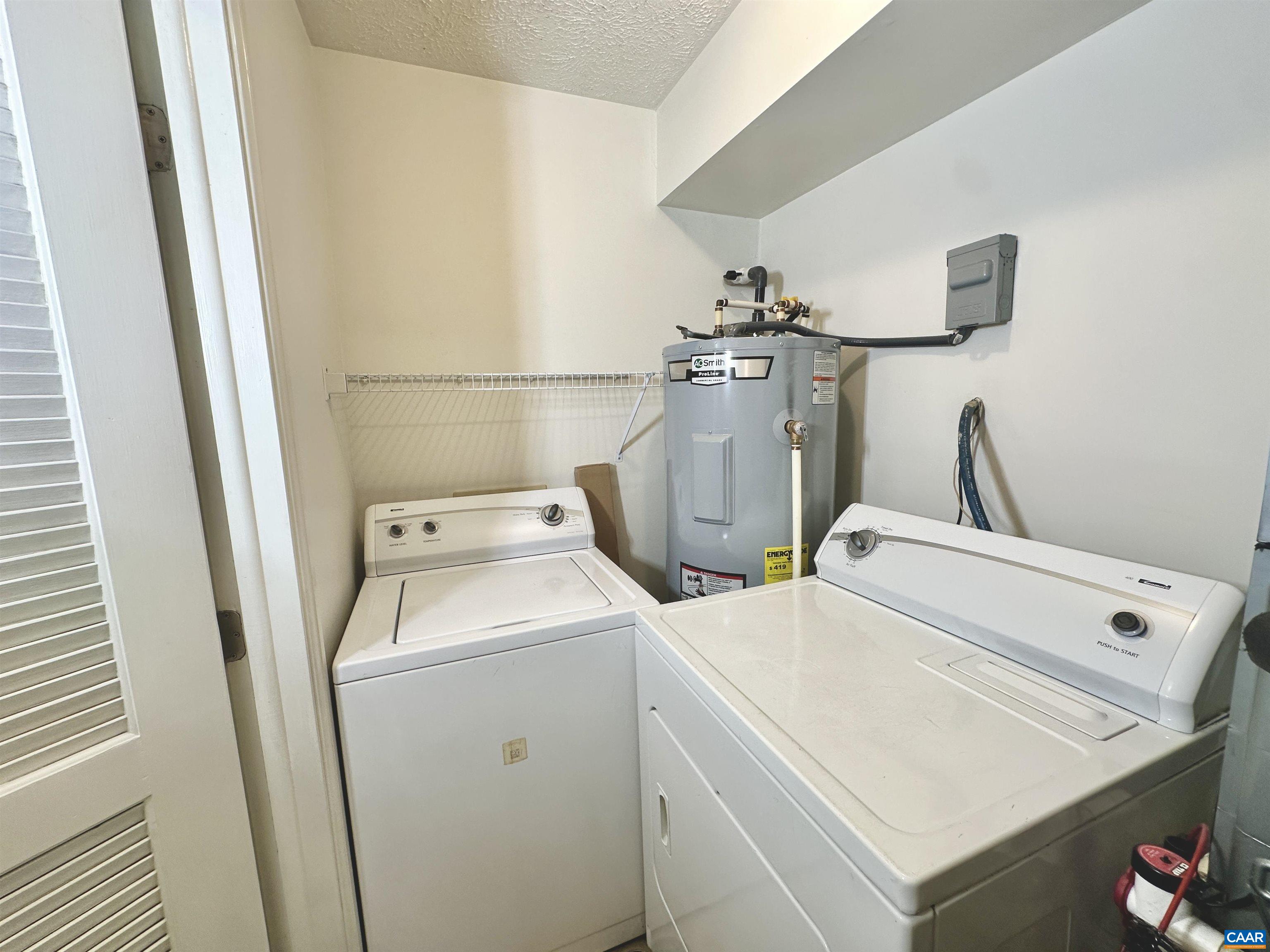 104 Turtle Creek Road, Unit 9 Charlottesville, VA 22901 - Photo 18 of 23 a utility room with dryer and washer