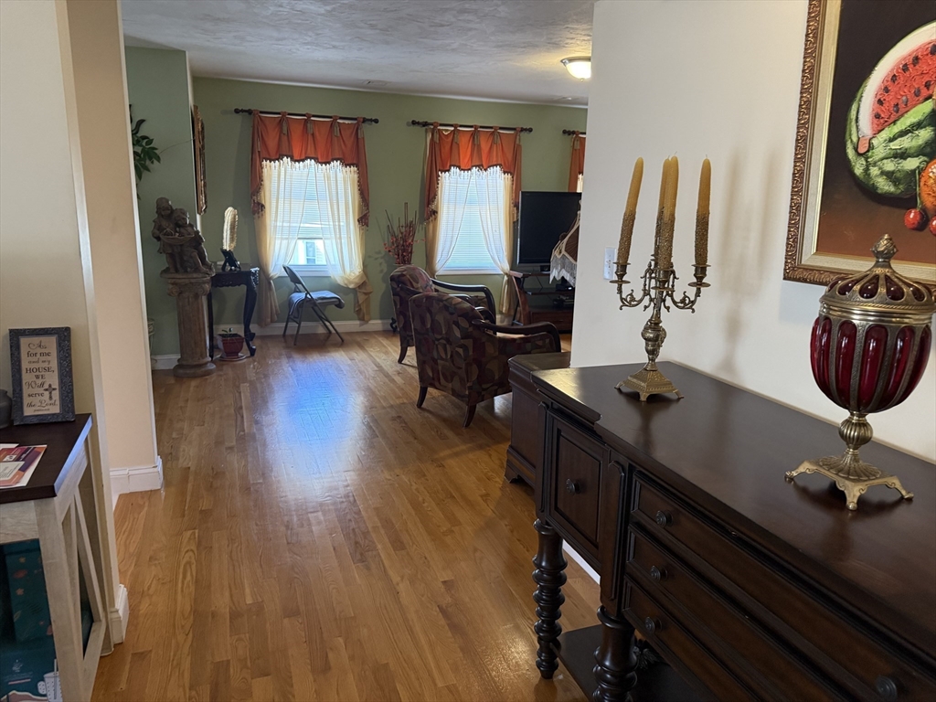 20 Massasoit Street Boston, MA 02136 - Photo 7 of 18 a view of a workspace with furniture and wooden floor