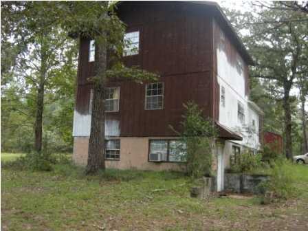4858 Hinote Road DeFuniak Springs, FL 32433 - Photo 1 of 27 a view of a house with a yard