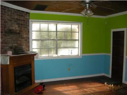 4858 Hinote Road DeFuniak Springs, FL 32433 - Photo 11 of 27 a room with window and a fireplace