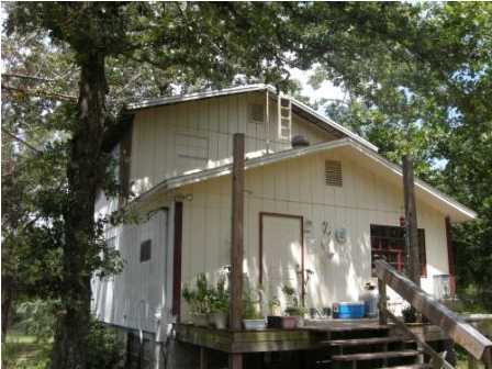 4858 Hinote Road DeFuniak Springs, FL 32433 - Photo 5 of 27 a house view with a outdoor space