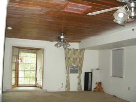 4858 Hinote Road DeFuniak Springs, FL 32433 - Photo 9 of 27 a view of a livingroom with a window