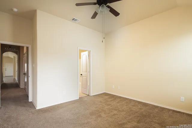 a view of a room with a walk in closet
