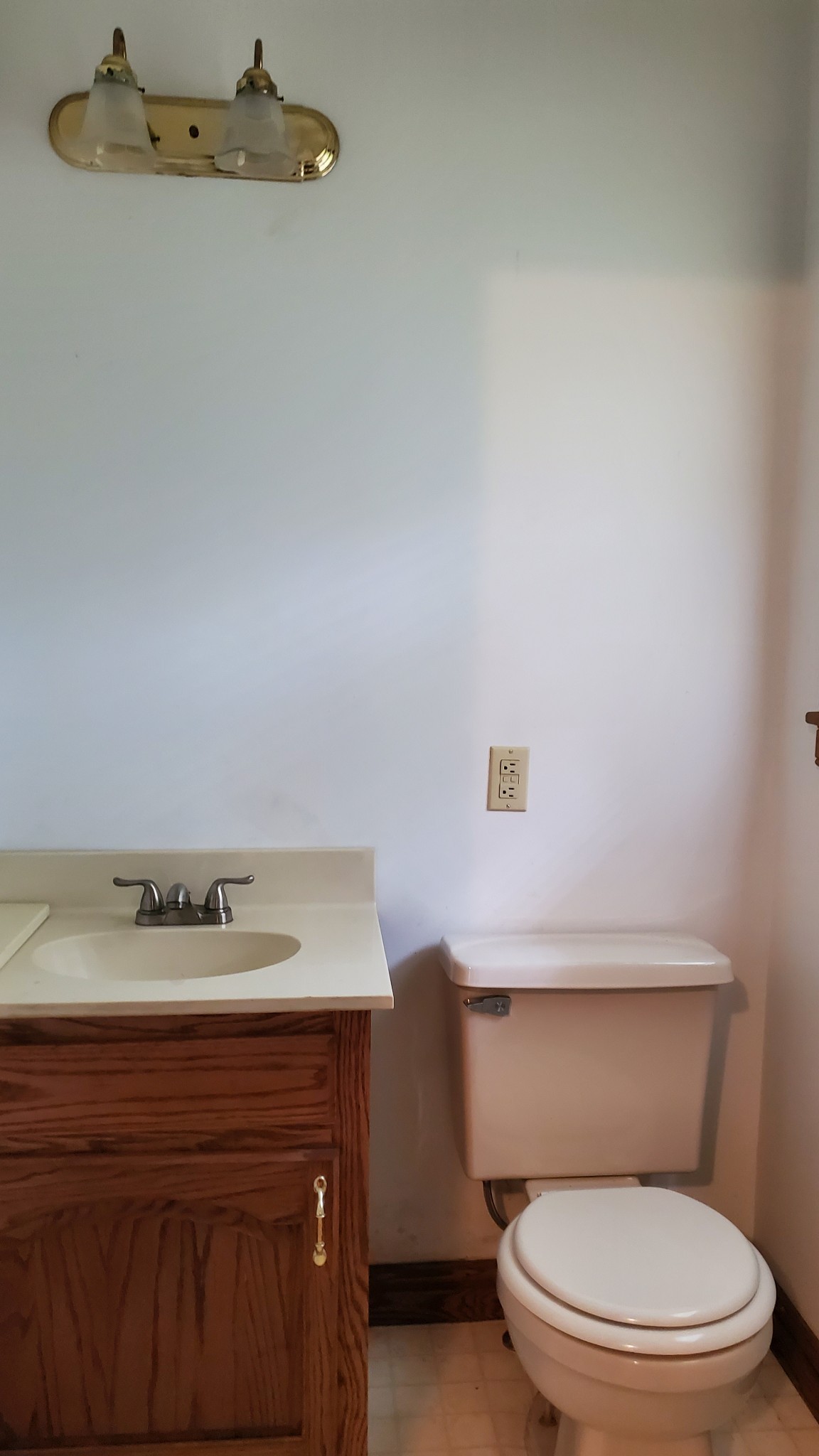 103 Waterloo Road Lawrenceburg, TN 38464 - Photo 12 of 21 a white toilet sitting next to a bathroom sink