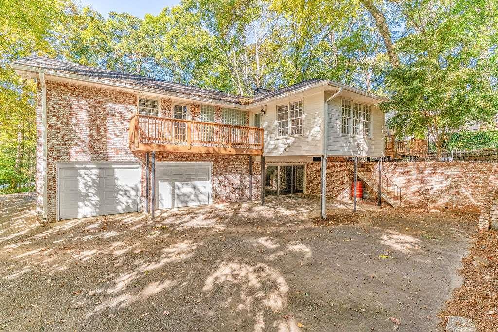 3911 Ivy Road Northeast Atlanta, GA 30342 - Photo 28 of 28 a house view with a outdoor space