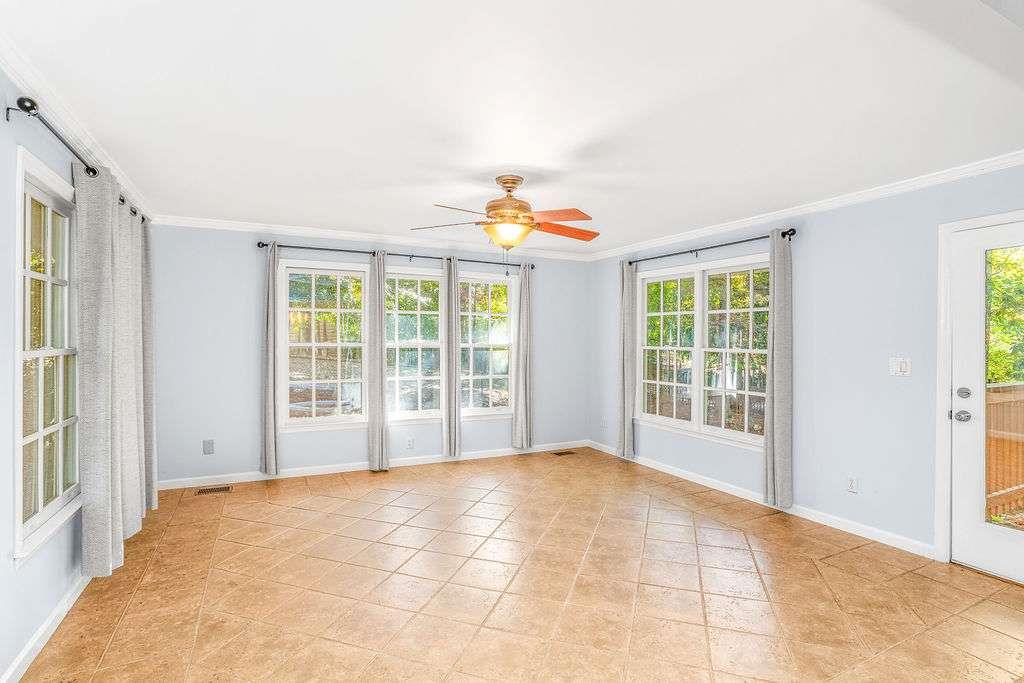 3911 Ivy Road Northeast Atlanta, GA 30342 - Photo 9 of 28 a view of an empty room with a window