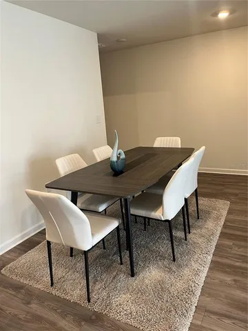 a view of a workspace with furniture