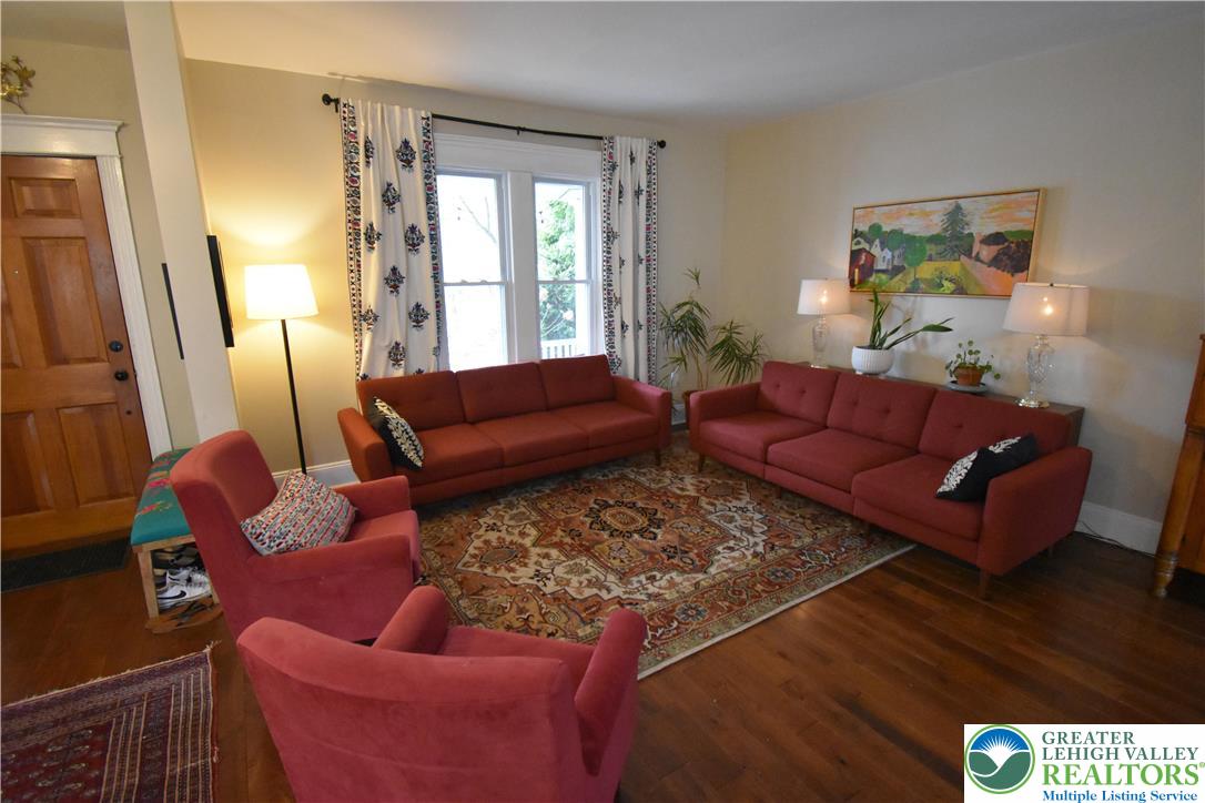 715 Coleman Street Easton, PA 18042 - Photo 6 of 38 a living room with furniture and a rug