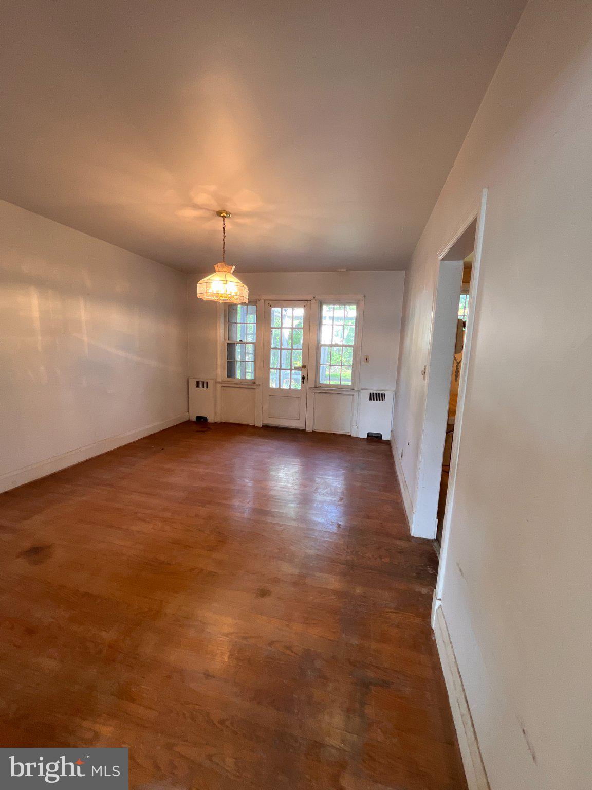 5906 Ayleshire Road Baltimore, MD 21239 - Photo 9 of 41 Spacious Dining room with door to rear porch.