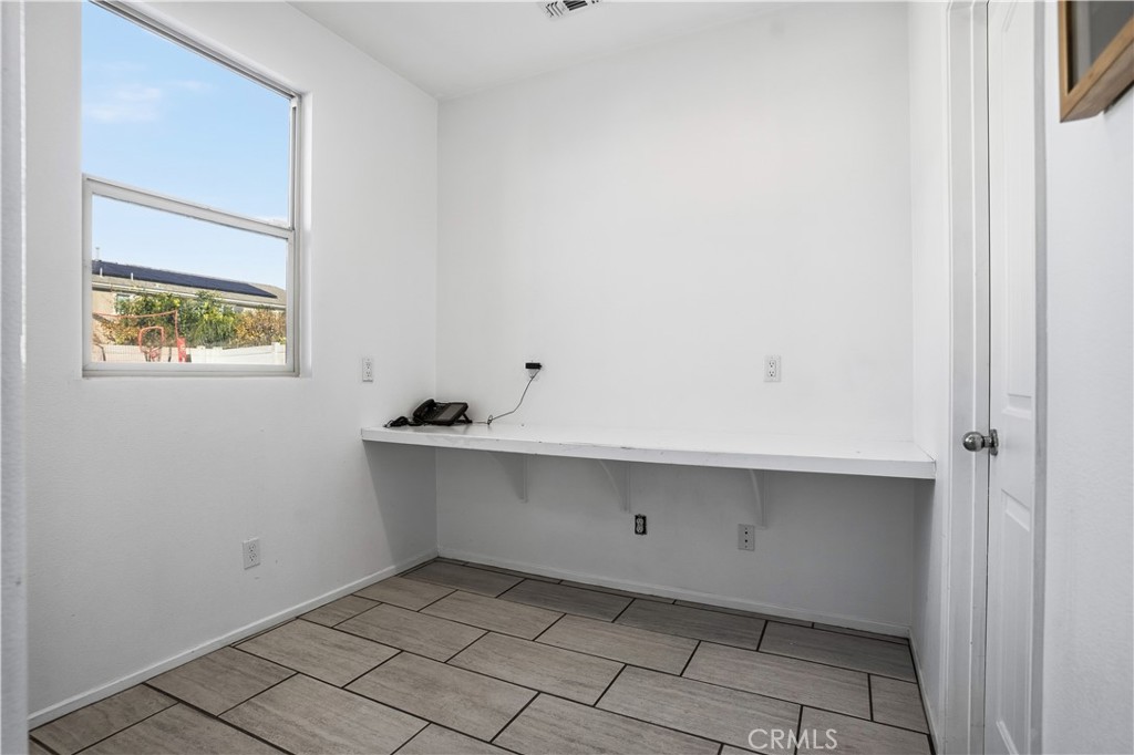 1120 Regala Street Perris, CA 92571 - Photo 31 of 70 Extra butlers panty with desk area