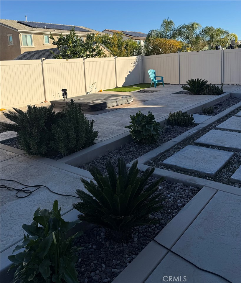 1120 Regala Street Perris, CA 92571 - Photo 58 of 70 Back yard concrete squares with astro turf and succulants
