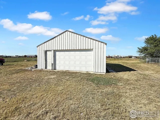a view of an ocean & house