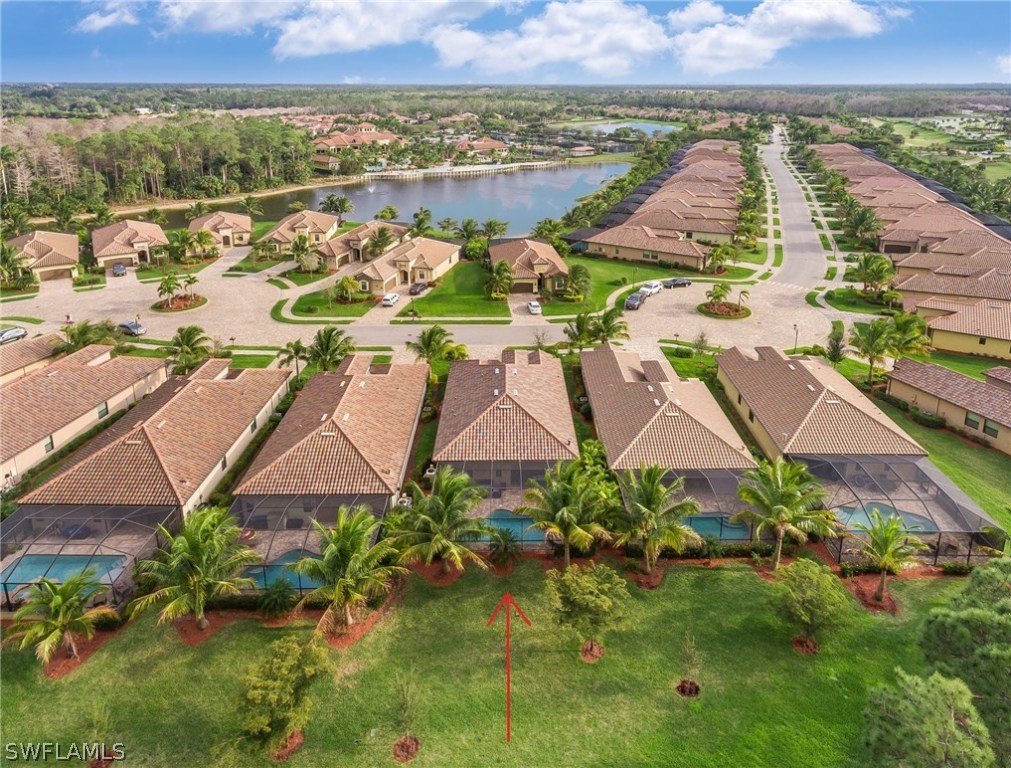 9495 Piacere Way Naples, FL 34113 - Photo 2 of 25 an aerial view of residential houses with outdoor space and swimming pool