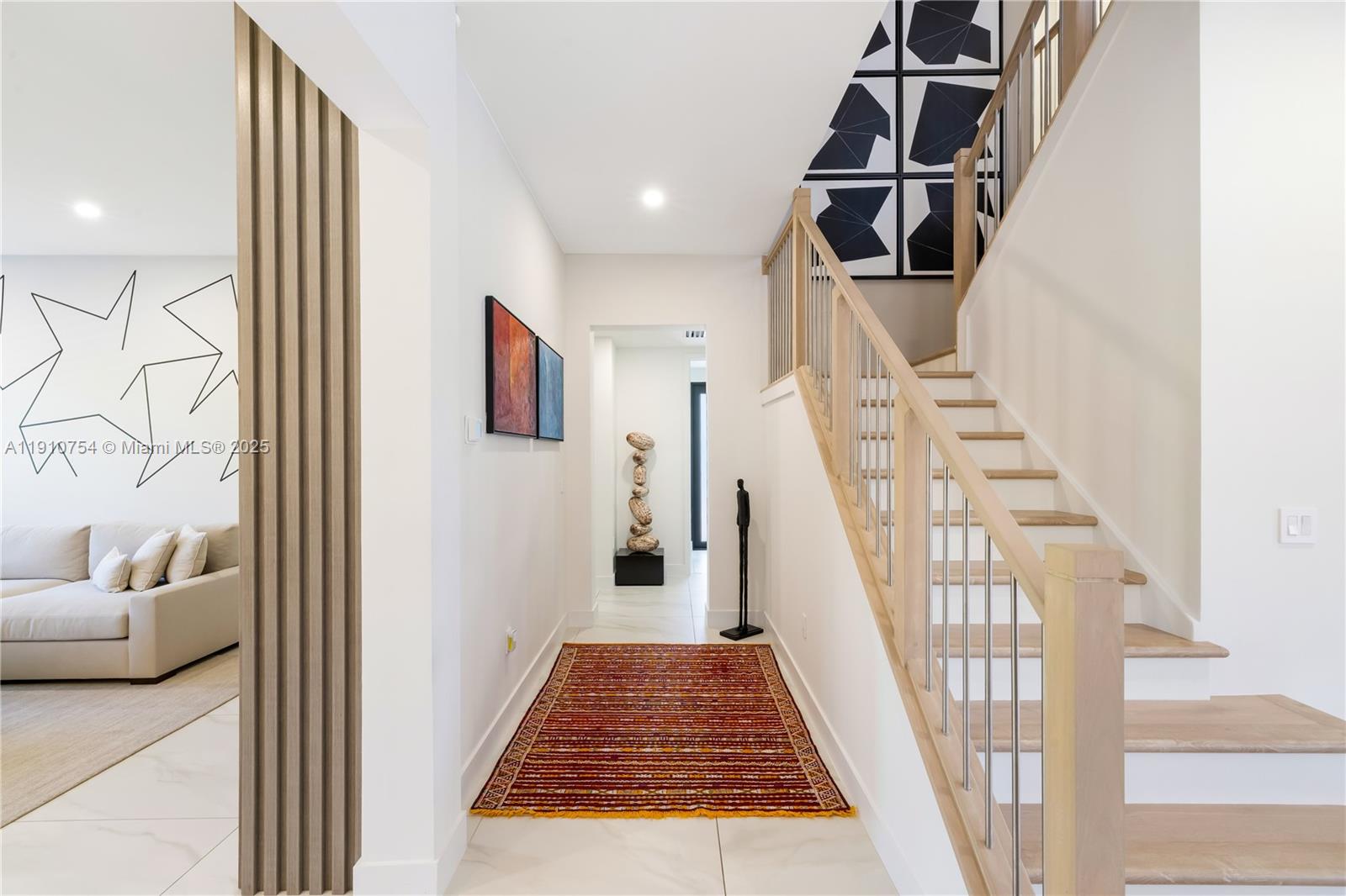12021 Southwest 82nd Place Miami, FL 33156 - Photo 19 of 44 a view of entryway and hall with wooden floor