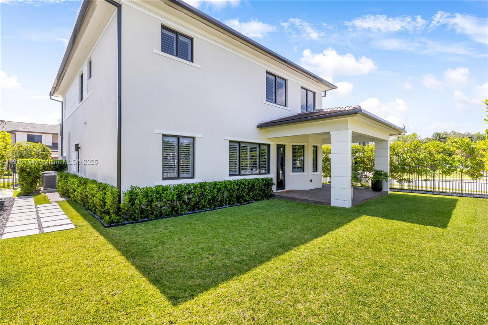 12021 Southwest 82nd Place Miami, FL 33156 - Photo 24 of 44 a view of house that has a yard
