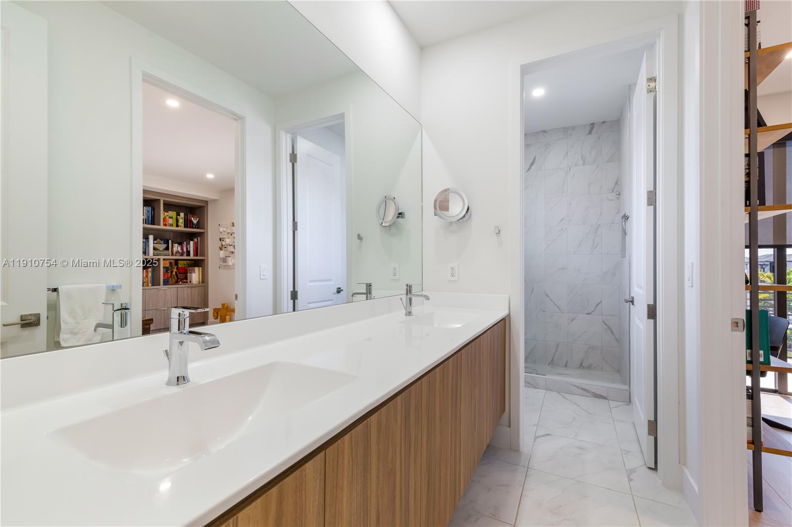 12021 Southwest 82nd Place Miami, FL 33156 - Photo 37 of 44 a bathroom with a sink and a mirror