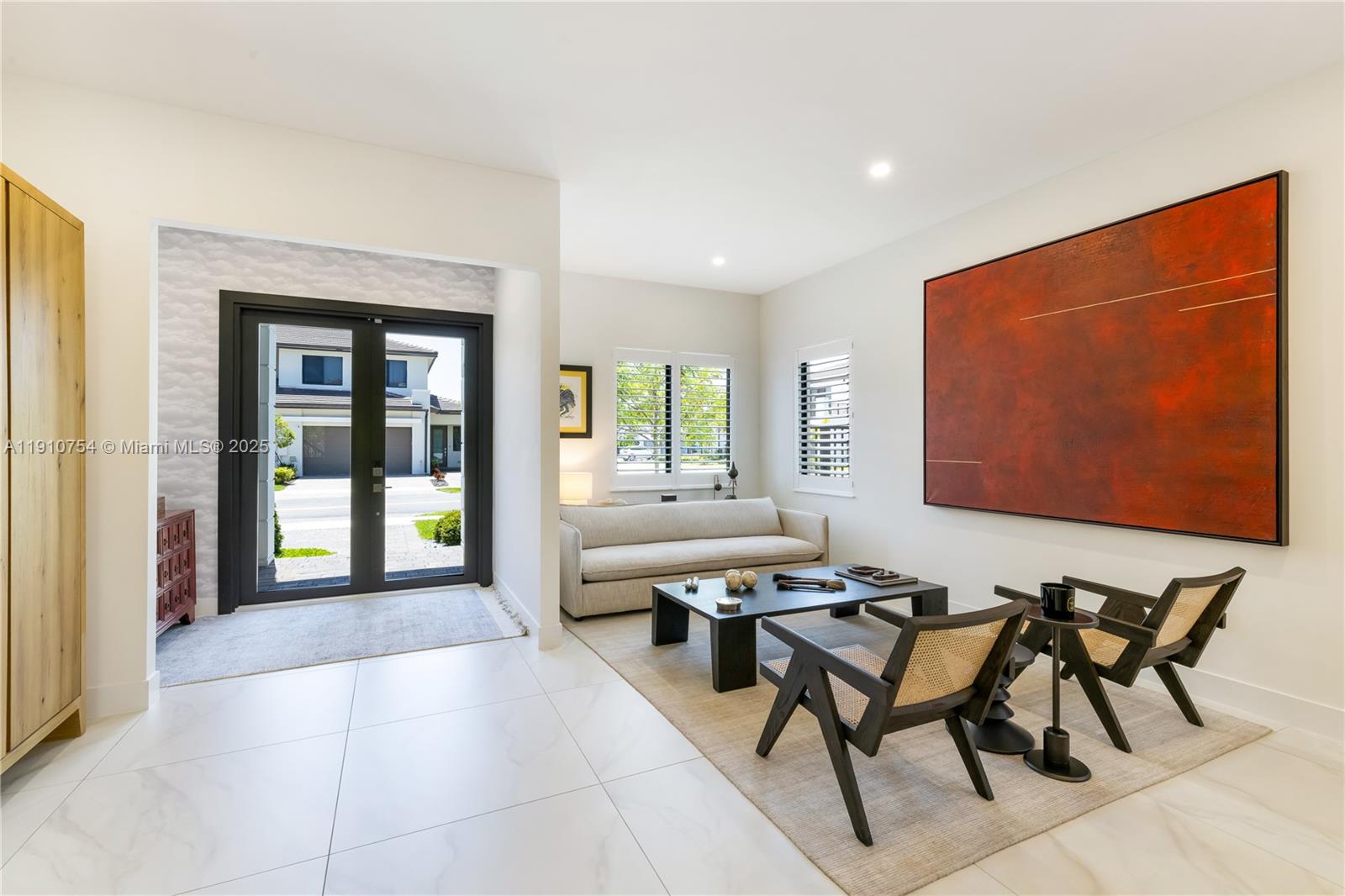 12021 Southwest 82nd Place Miami, FL 33156 - Photo 4 of 44 a lobby with furniture and window