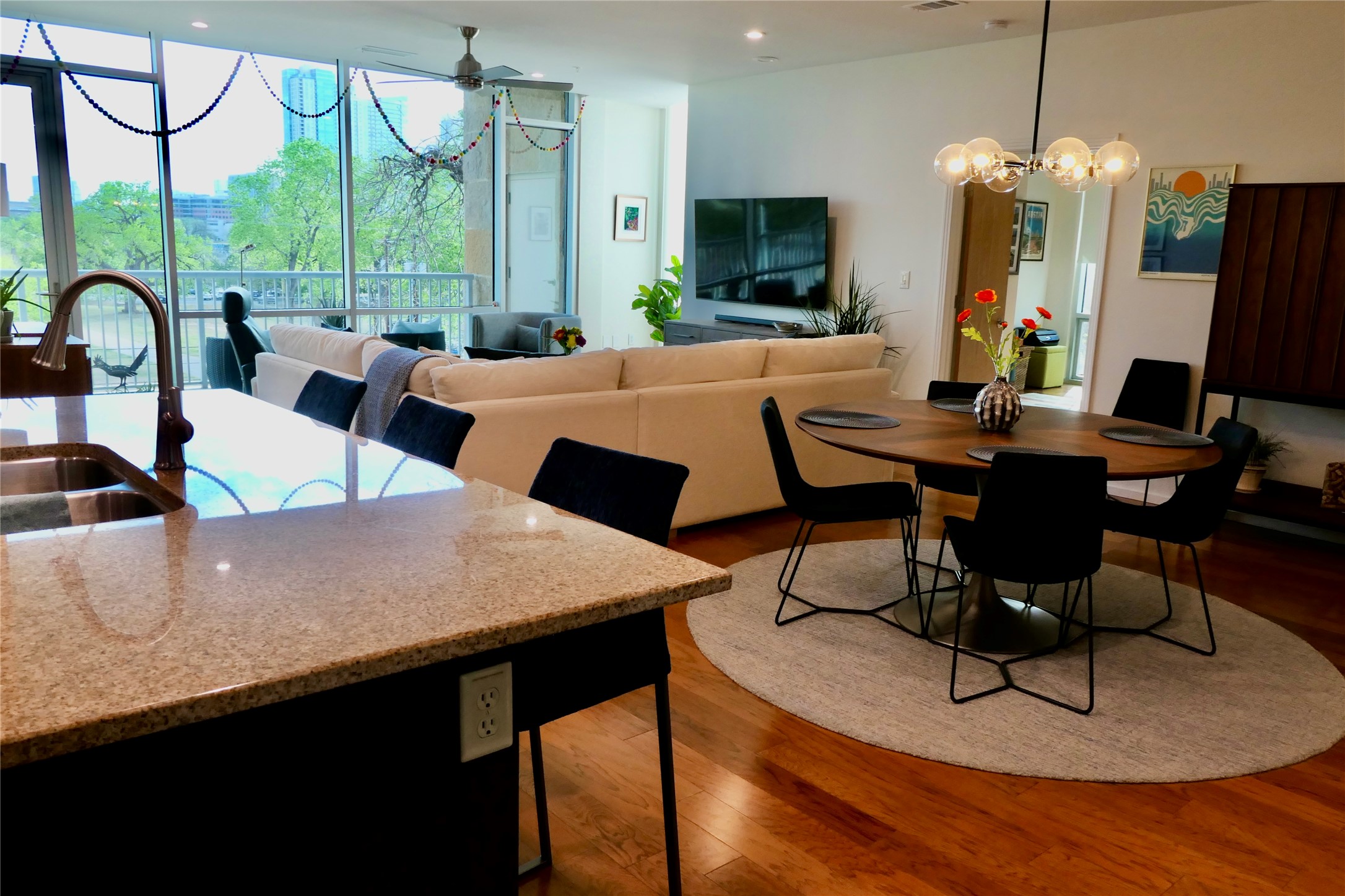 a view of a dining room with furniture window and outside view