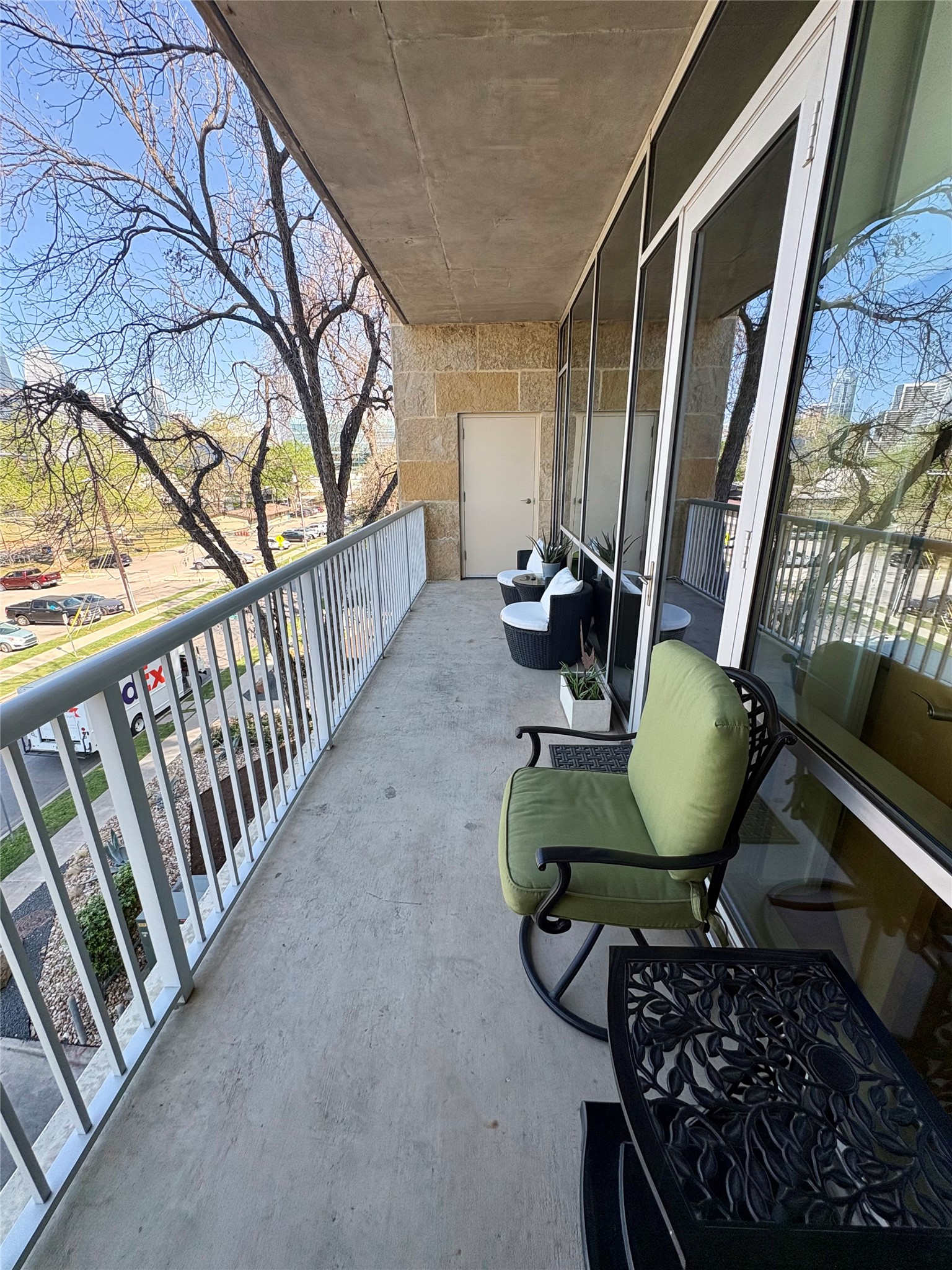 1600 Barton Springs Road, Unit 1301 Austin, TX 78704 - Photo 16 of 27 a living room with furniture and a floor to ceiling window