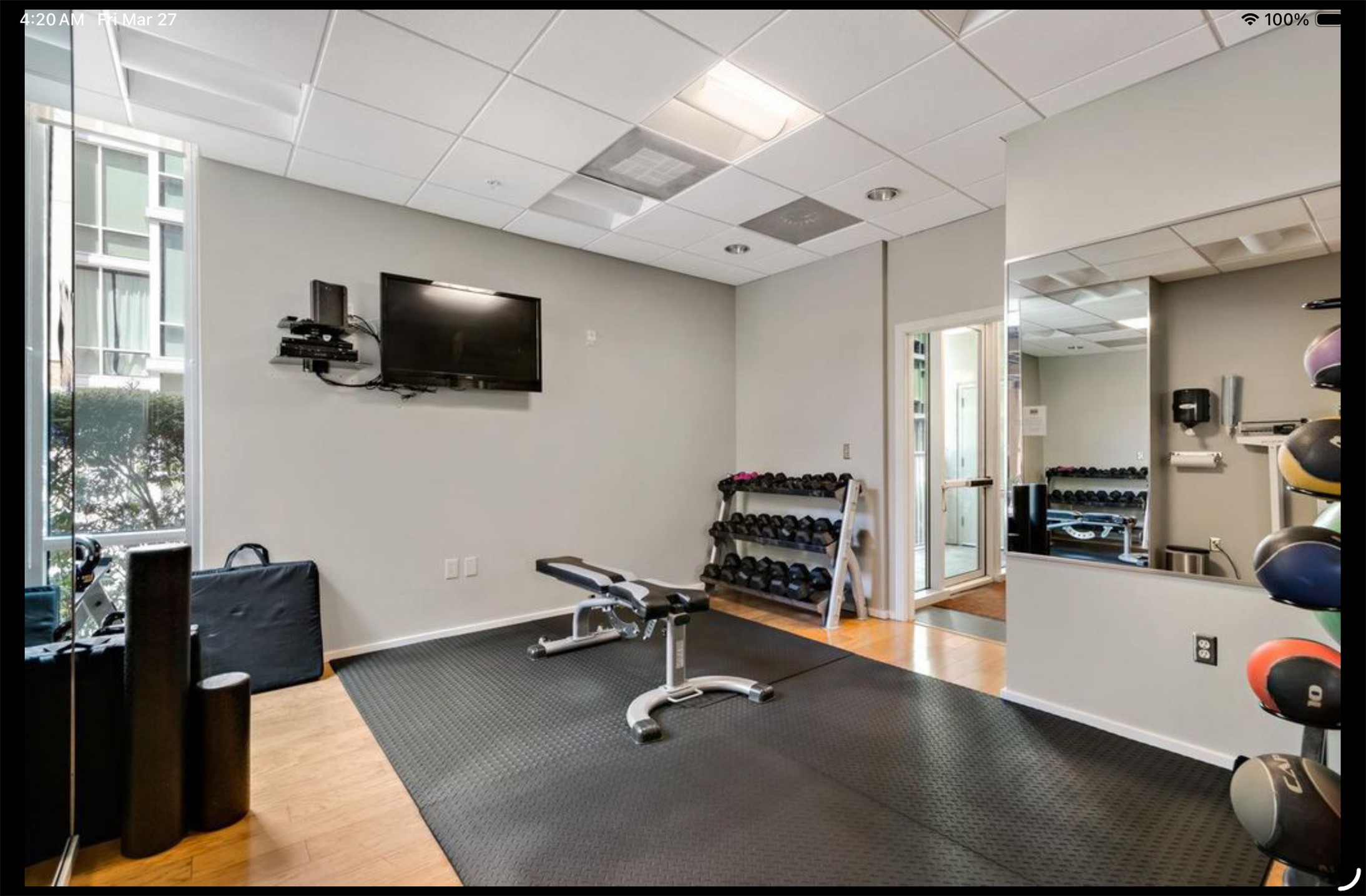 1600 Barton Springs Road, Unit 1301 Austin, TX 78704 - Photo 20 of 27 a view of a livingroom with workspace and a flat screen tv