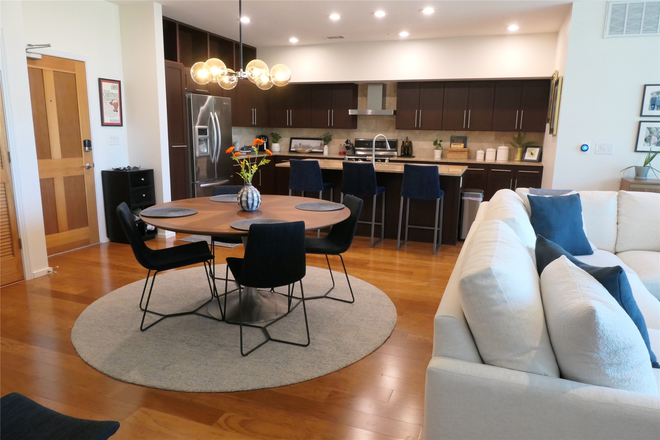 1600 Barton Springs Road, Unit 1301 Austin, TX 78704 - Photo 23 of 27 a living room with furniture kitchen view and a large window