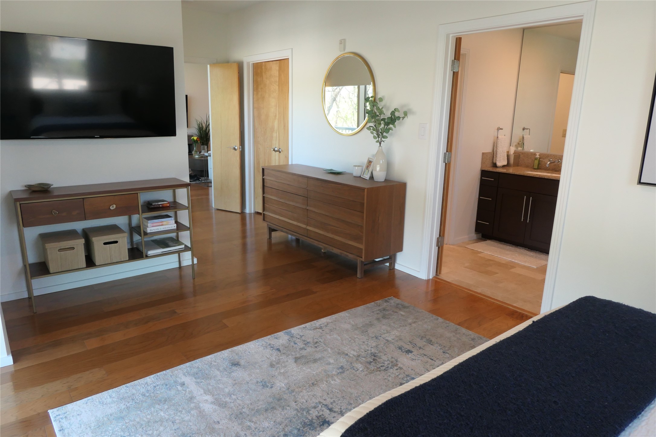 1600 Barton Springs Road, Unit 1301 Austin, TX 78704 - Photo 26 of 27 a living room with furniture and a flat screen tv