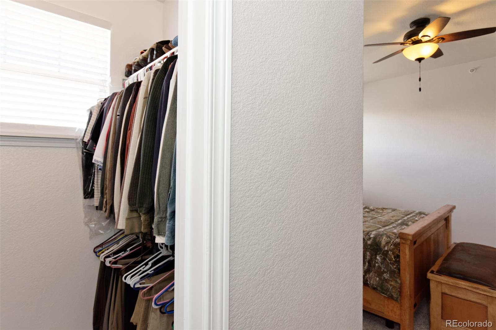 8440 Canyon Rim Trail, Unit 4 Parker, CO 80134 - Photo 17 of 28 a view of a closet with storage