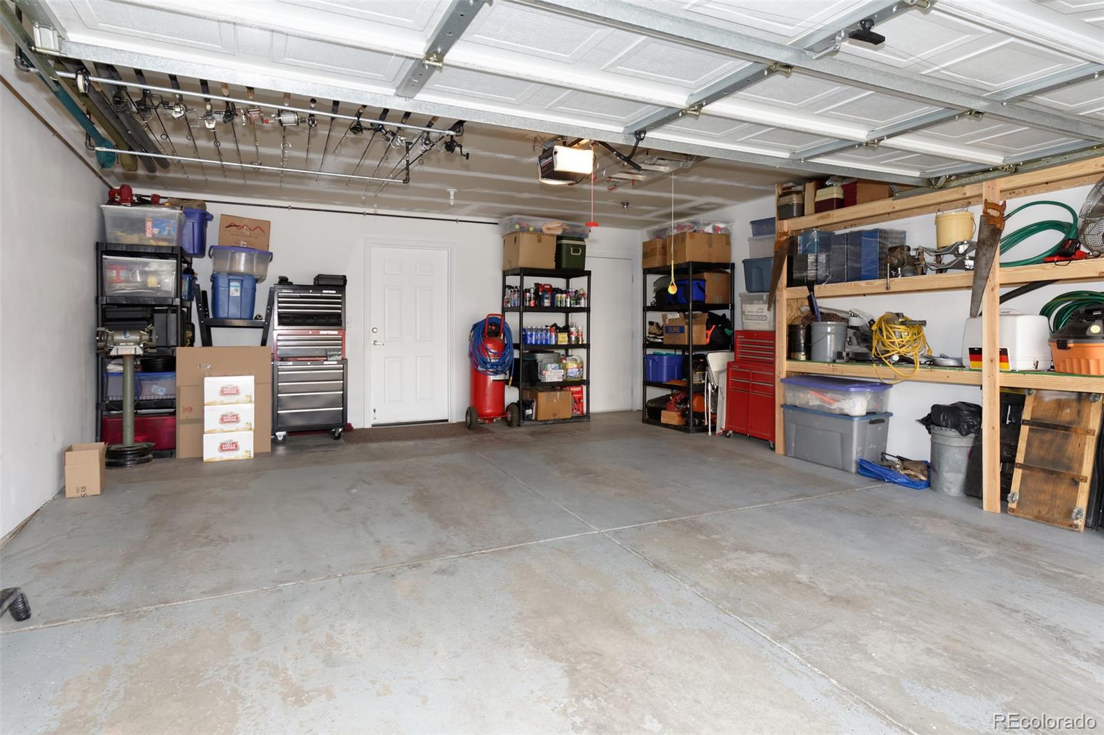 8440 Canyon Rim Trail, Unit 4 Parker, CO 80134 - Photo 26 of 28 a view of a storage room with racks
