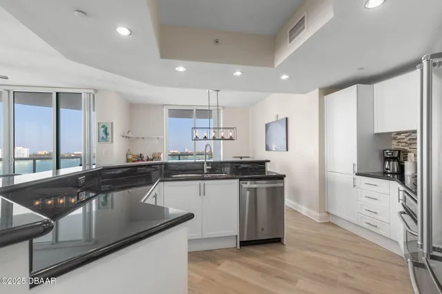 a view of a lake with a building in front of it