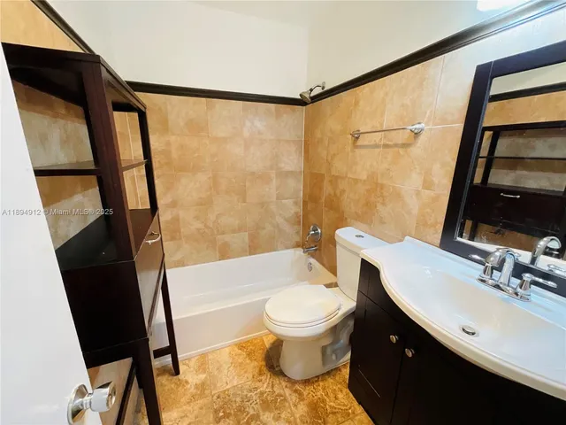 $155,000 | 419 Golden Isles Drive, Unit 106, Hallandale Beach, FL 33009