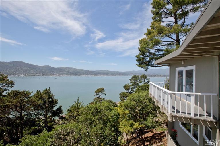 4 Eucalyptus Road Belvedere, CA 94920 - Photo 1 of 1 a balcony with trees in front of it