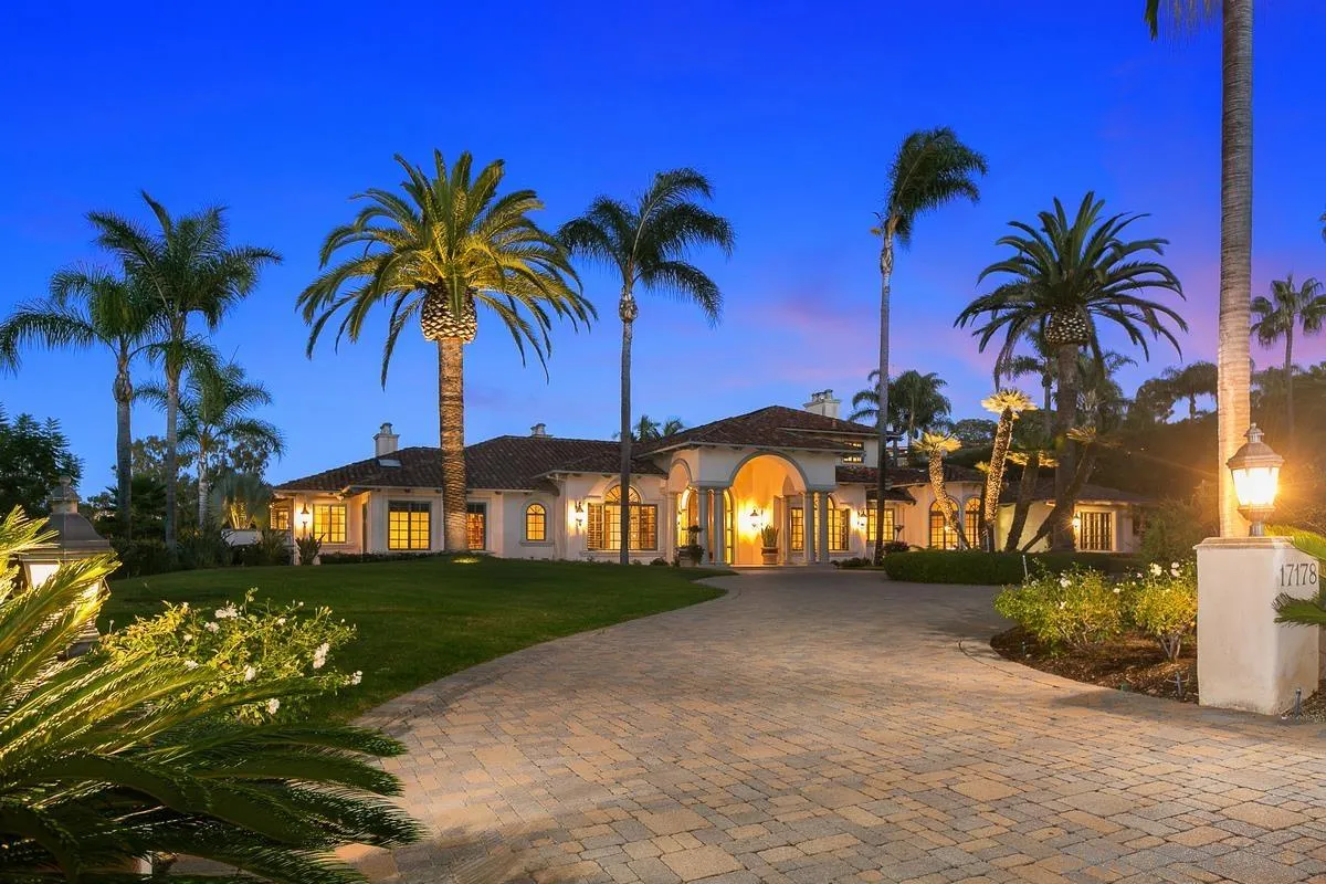17178 Circa Oriente Rancho Santa Fe, CA 92067 - Photo 3 of 27 a front view of house with palm trees