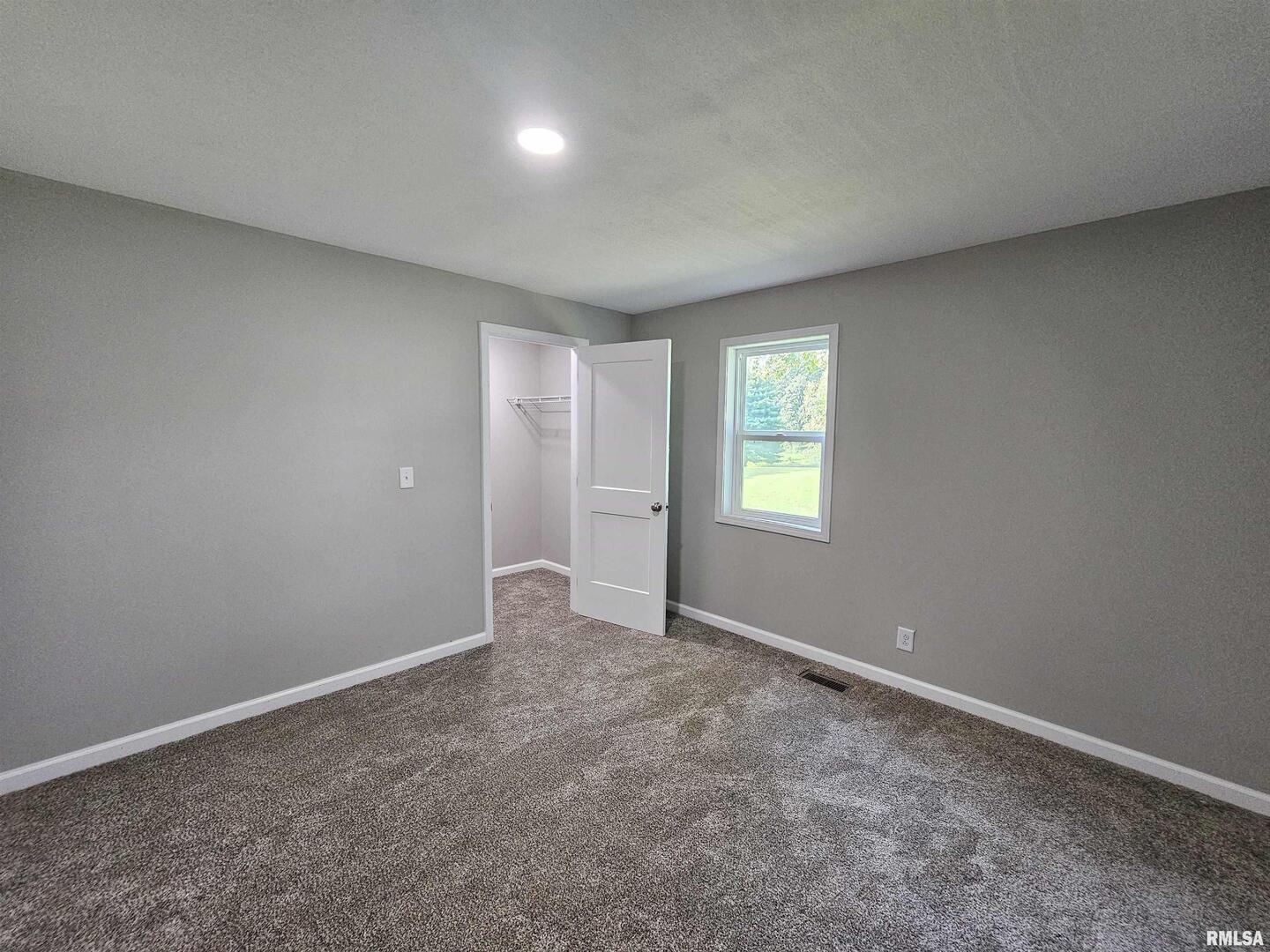 16530 East Fairfield Road Mount Vernon, IL 62864 - Photo 28 of 28 an empty room with windows