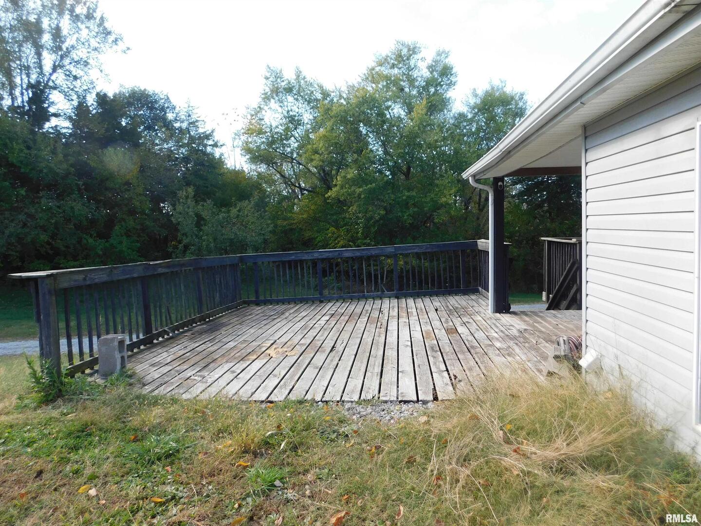 2517 Highway 17 Viola, IL 61486 - Photo 23 of 25 a view of backyard with wooden deck and floor