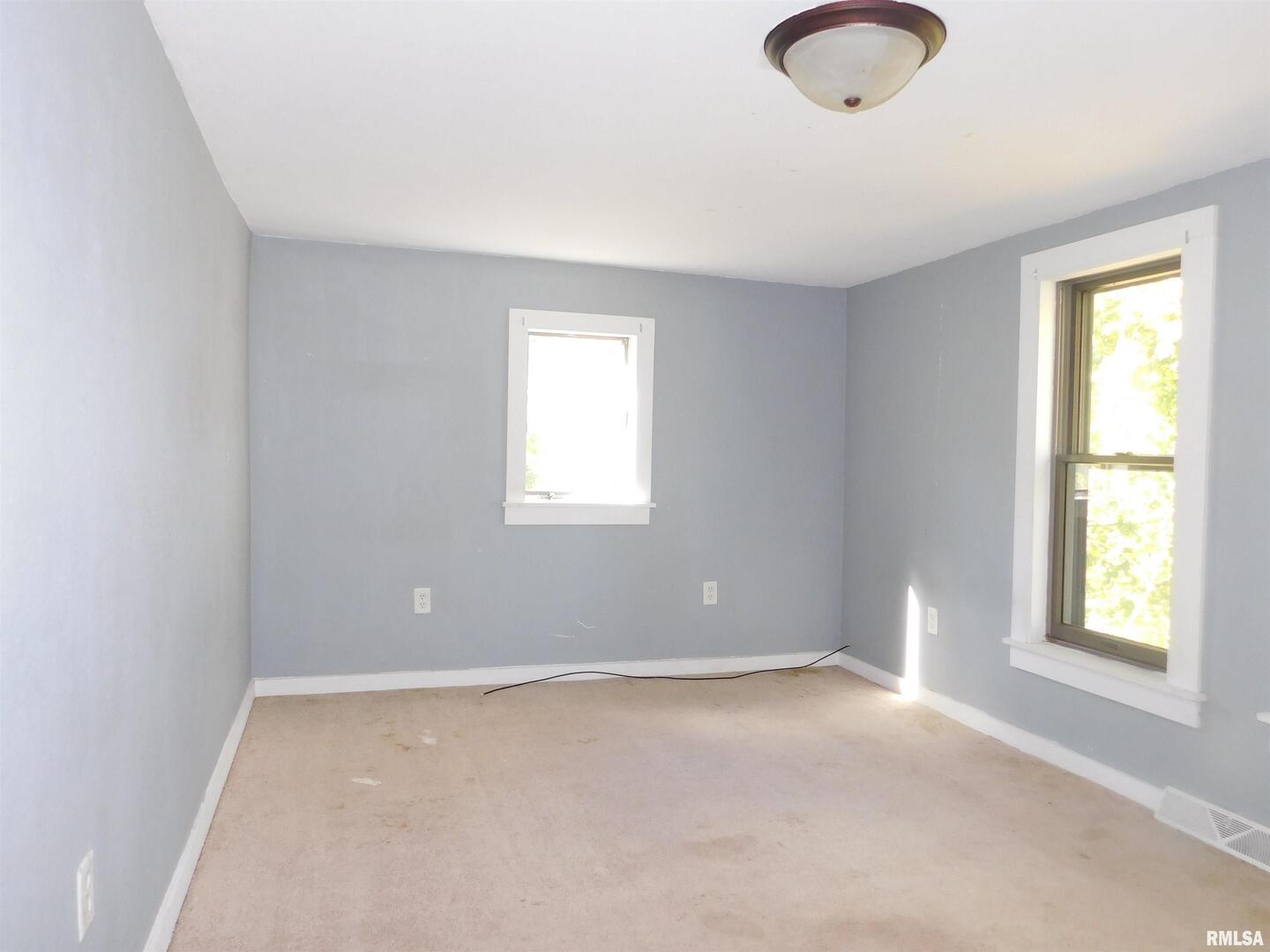 2517 Highway 17 Viola, IL 61486 - Photo 9 of 25 a view of an empty room with a window