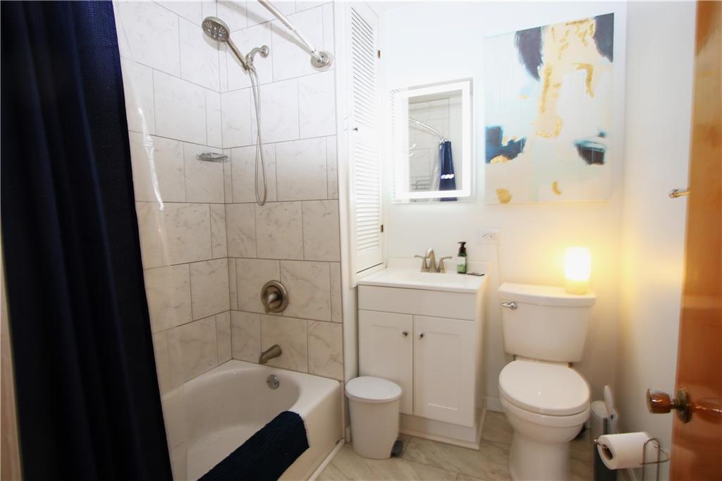 102 10th Street Monongahela, PA 15063 - Photo 17 of 31 a bathroom with a sink toilet and shower