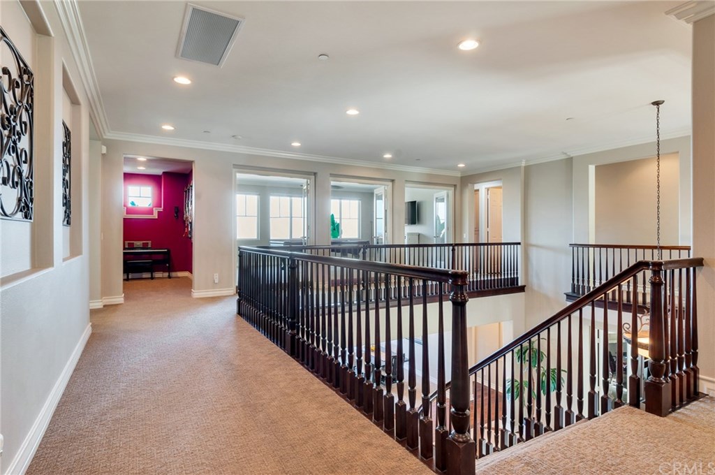2470 Bulrush Circle Corona, CA 92882 - Photo 37 of 64 a view of a hallway with workspace