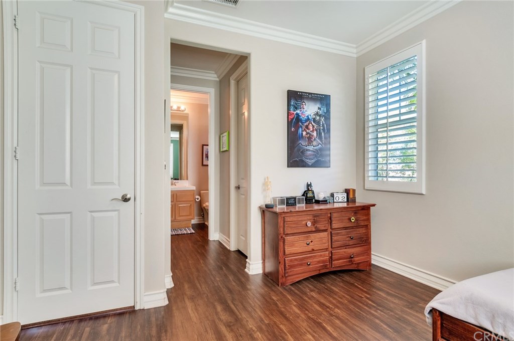 2470 Bulrush Circle Corona, CA 92882 - Photo 42 of 64 a room with furniture and wooden floor