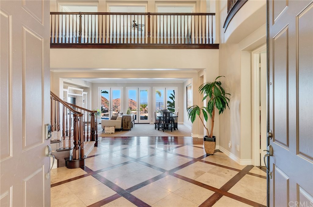 2470 Bulrush Circle Corona, CA 92882 - Photo 8 of 64 a view of a livingroom with furniture and floor to ceiling window