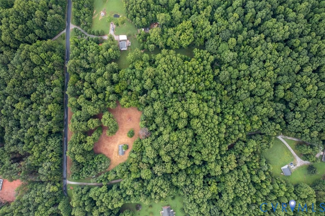 Aerial view of property and surrounding area featu