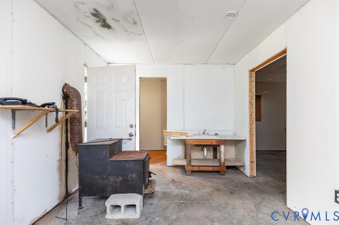 6610 Blenheim Road Powhatan, VA 23139 - Photo 18 of 26 Misc room with unfinished concrete floors