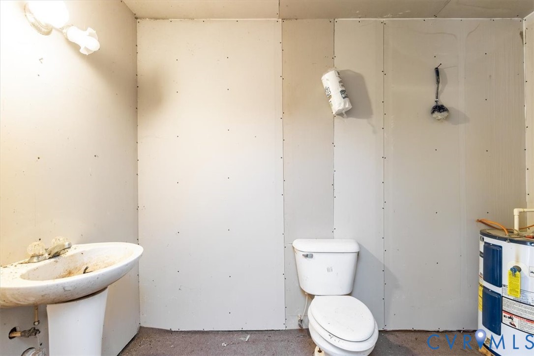 6610 Blenheim Road Powhatan, VA 23139 - Photo 19 of 26 Bathroom with electric water heater and toilet