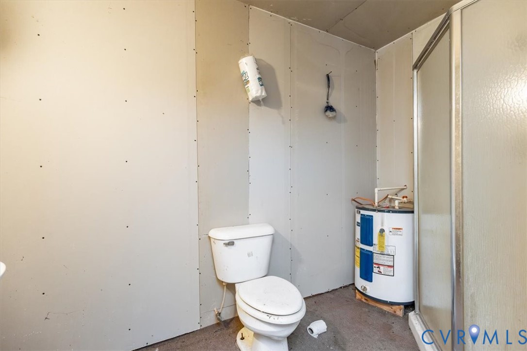 6610 Blenheim Road Powhatan, VA 23139 - Photo 21 of 26 Bathroom featuring a shower stall and electric wat