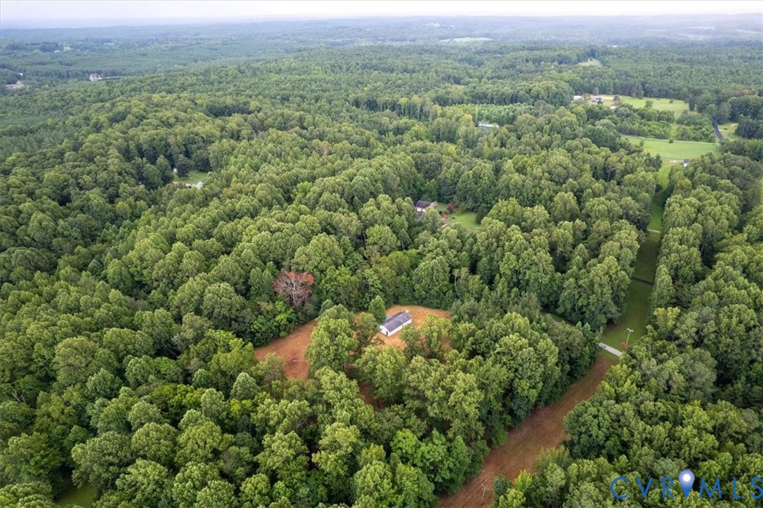 Aerial view of property and surrounding area featu