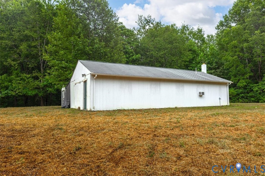 6610 Blenheim Road Powhatan, VA 23139 - Photo 8 of 26 View of property exterior with an outbuilding, a c