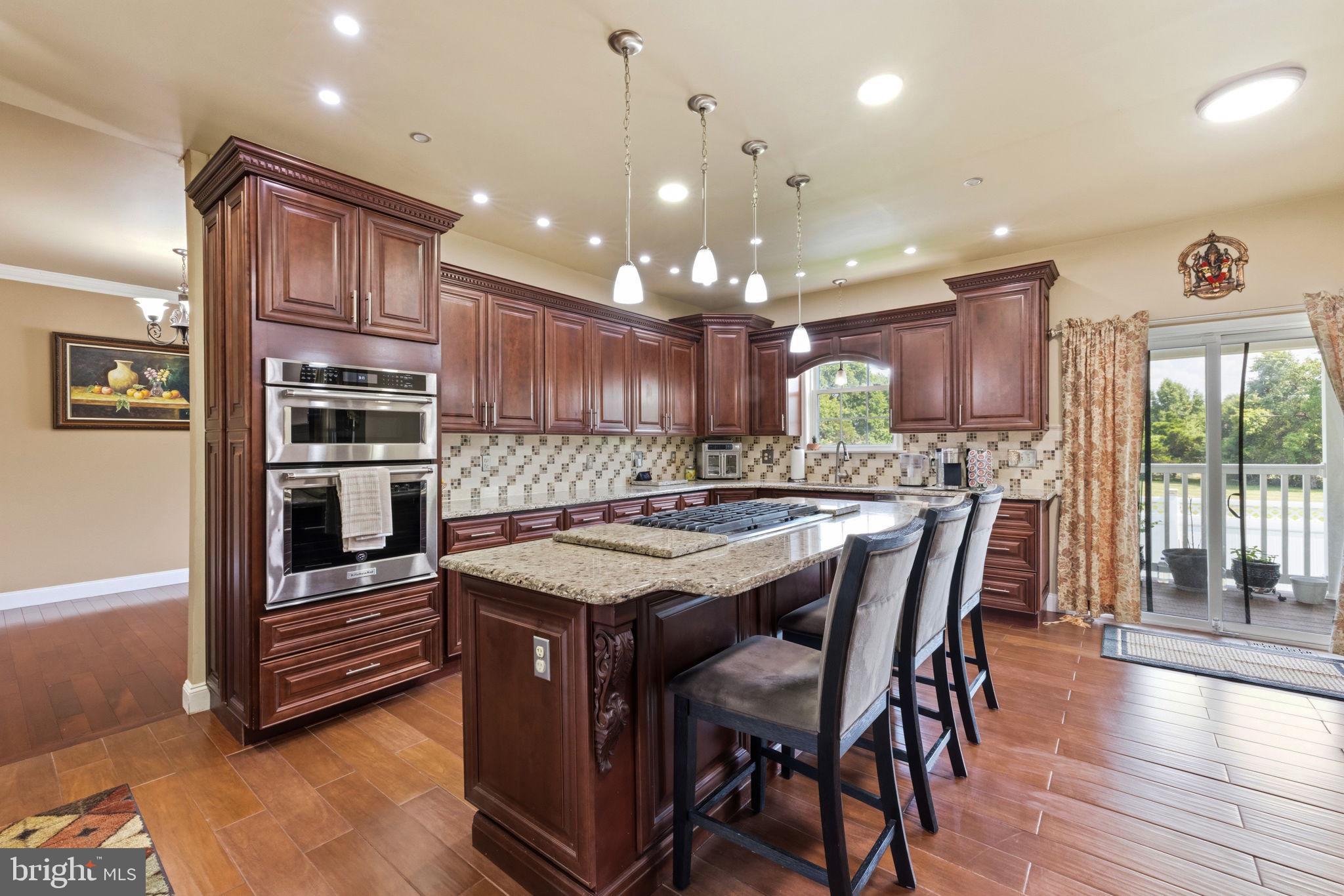 17 Paddock Road Marlton, NJ 08053 - Photo 12 of 54 Elegant kitchen with rich wood accents.